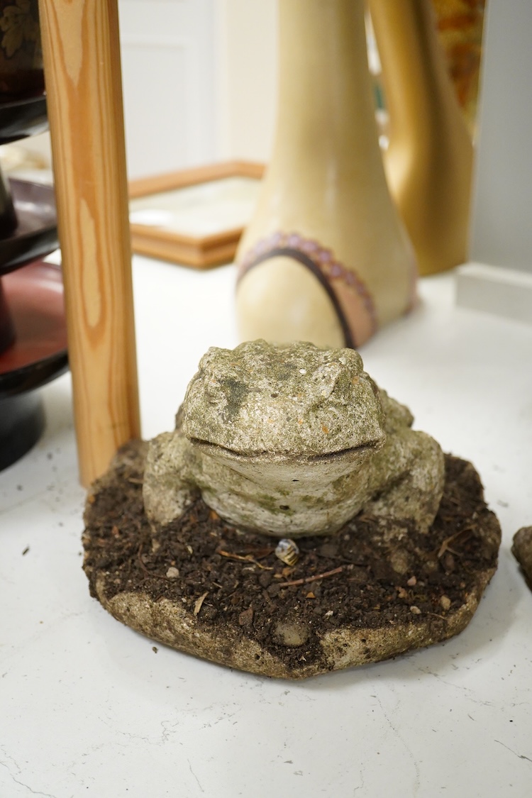 A garden composition stone model of a pig - 29cm high and a similar toad